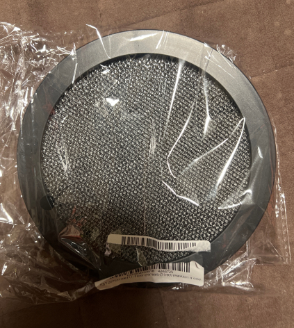 Round replacement filter element sealed in clear protective packaging