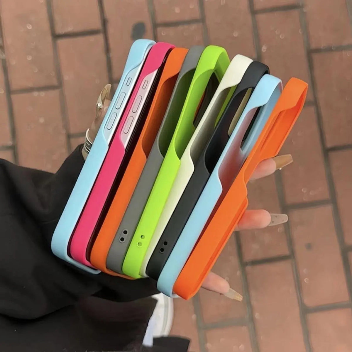 Frosted half-pack iPhone cases shown in several bright colors